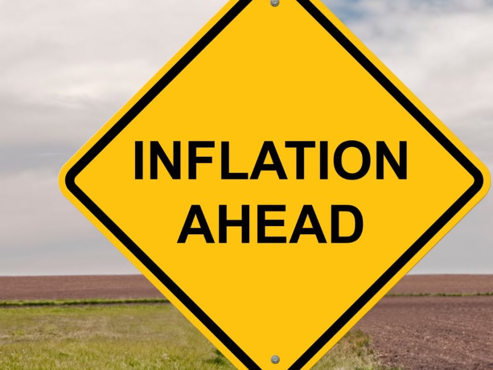 Road sign reads "Inflation Ahead"